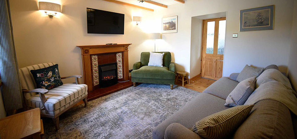 Our self catering accomodation cottage near Portree has a cosy living room with electric fire widescreen TV and WIFI internet
