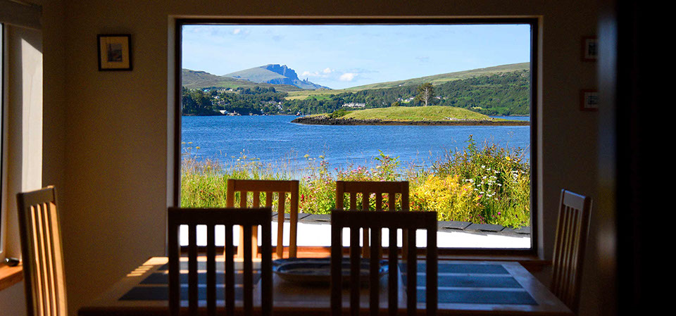Caberfeidh Boat House looks on to amazing sea views of Portree Bay and the Old Man of Storr from our self catering accommodation