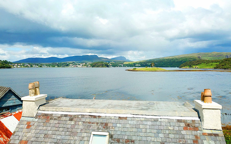 Caberfeidh Boat House is a sea view self catering accommodation cottage located near Portree with sea views of Loch Portree